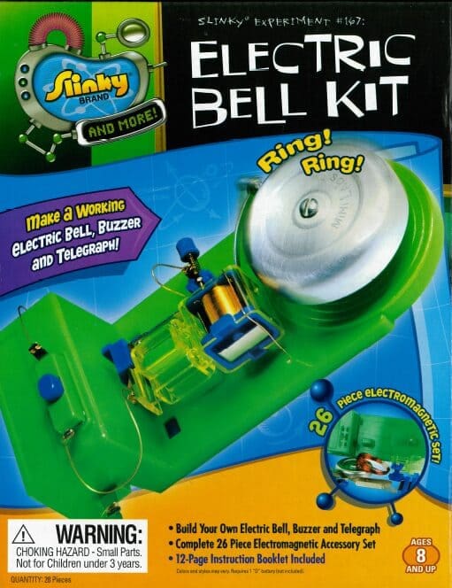 A green toy with a bell on it.