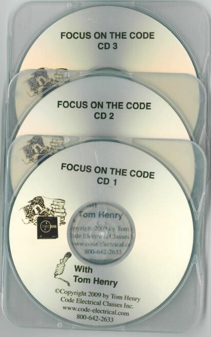 A stack of cds with the words focus on the code.