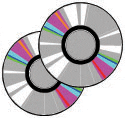 Two cds with a rainbow colored rim on top of each other.