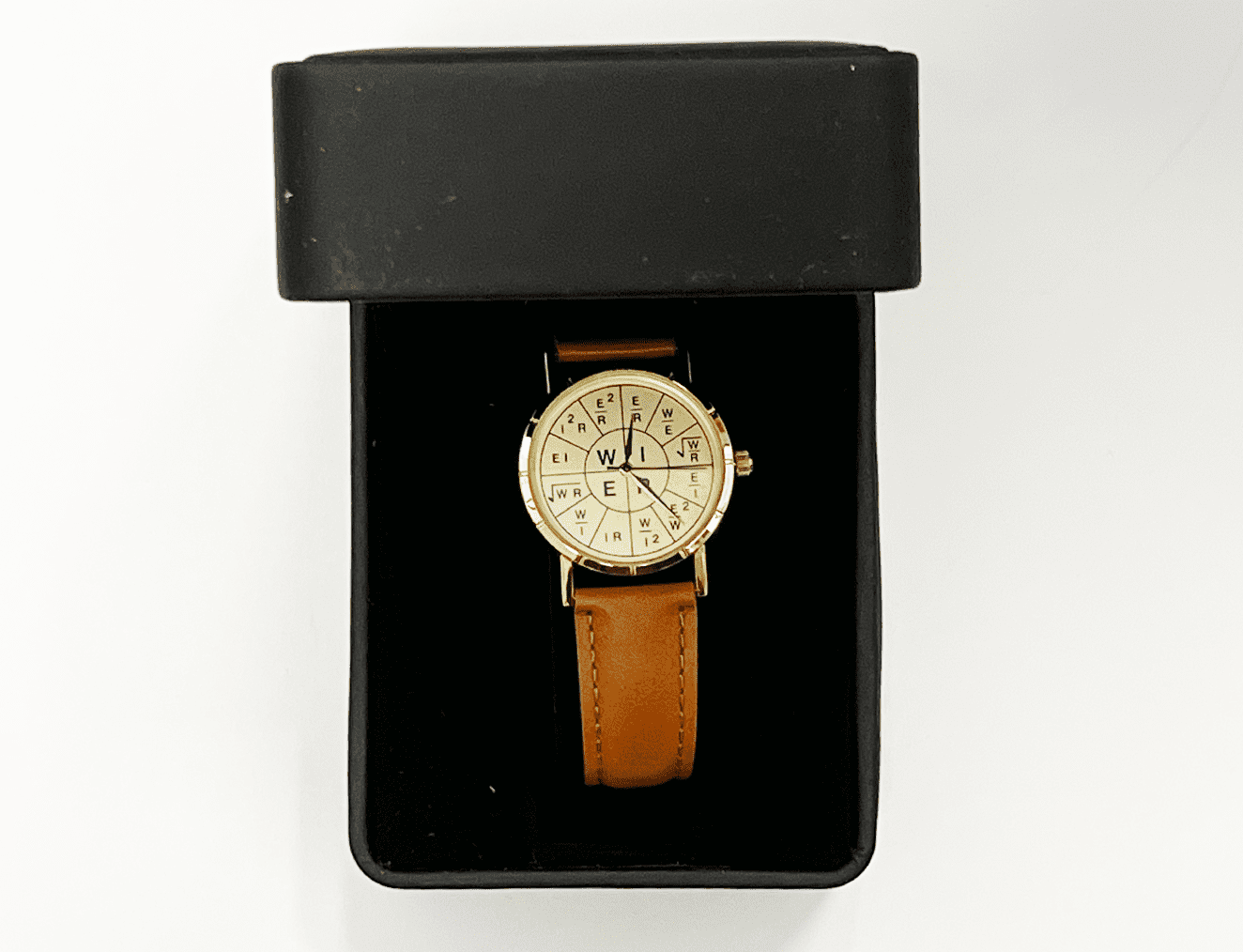 A watch is in its box and it's case.